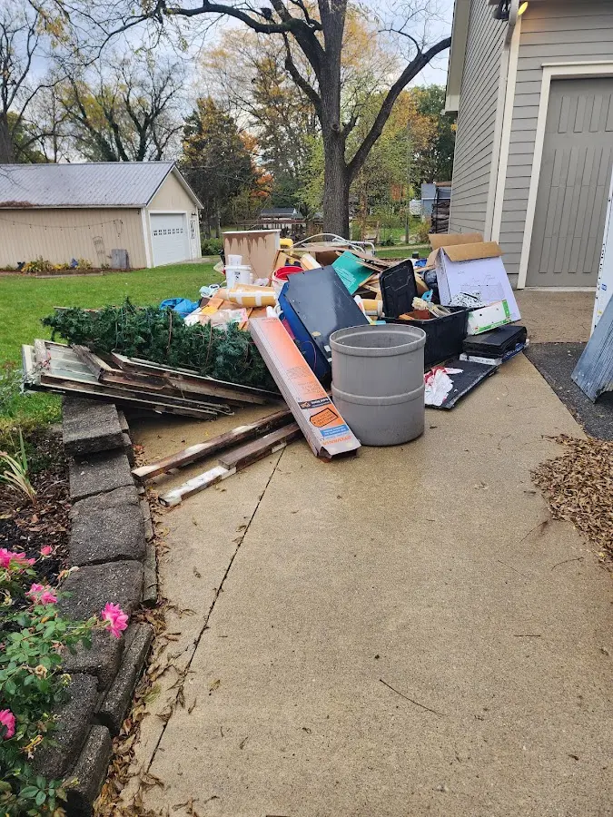 Dumpster being loaded with debris for 30 Yard Dumpster Rental in Smithsburg